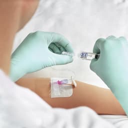 Caresite Micro patient access handling-Caresite used on patient, about to connect to Syringe