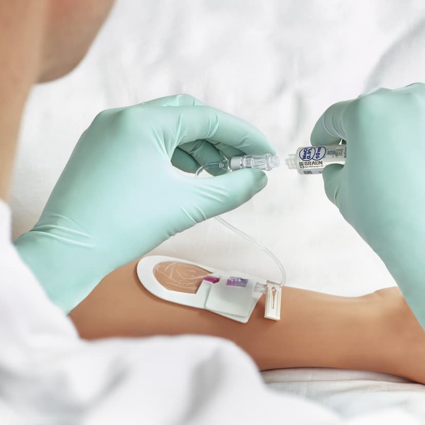 Caresite Micro patient access handling-Caresite used on patient, about to connect to Syringe