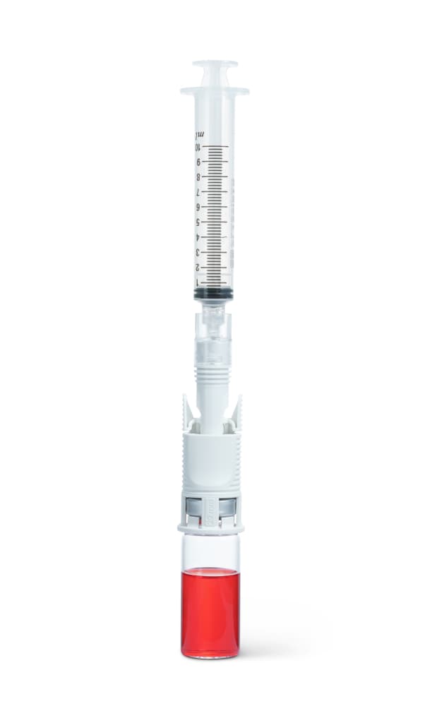 Chemfort Vial and Syringe adaptor-Picture of Chemfort Vial and Syringe adaptor connected to red drug, Vial and Syringe